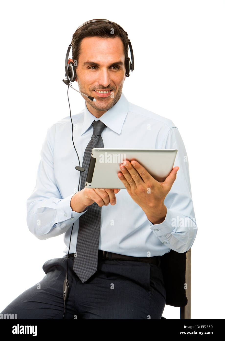 Porträt eines lächelnden Geschäftsmann mit Kopfhörer und dital tablet Stockfoto