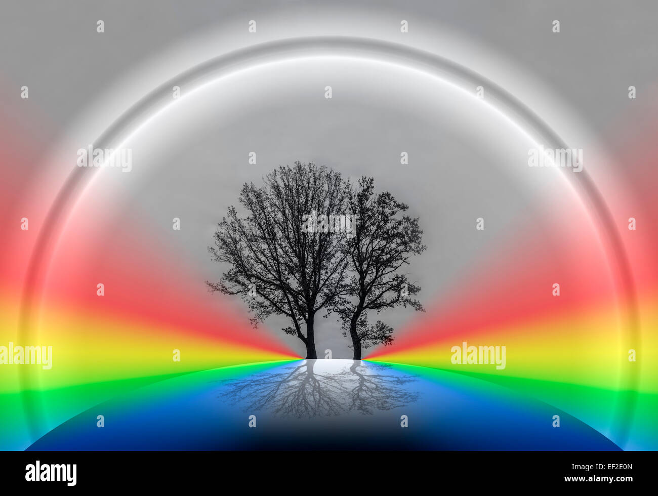 Imaginäre Winterlandschaft mit einem leuchtenden Kreis und Regenbögen. Stockfoto