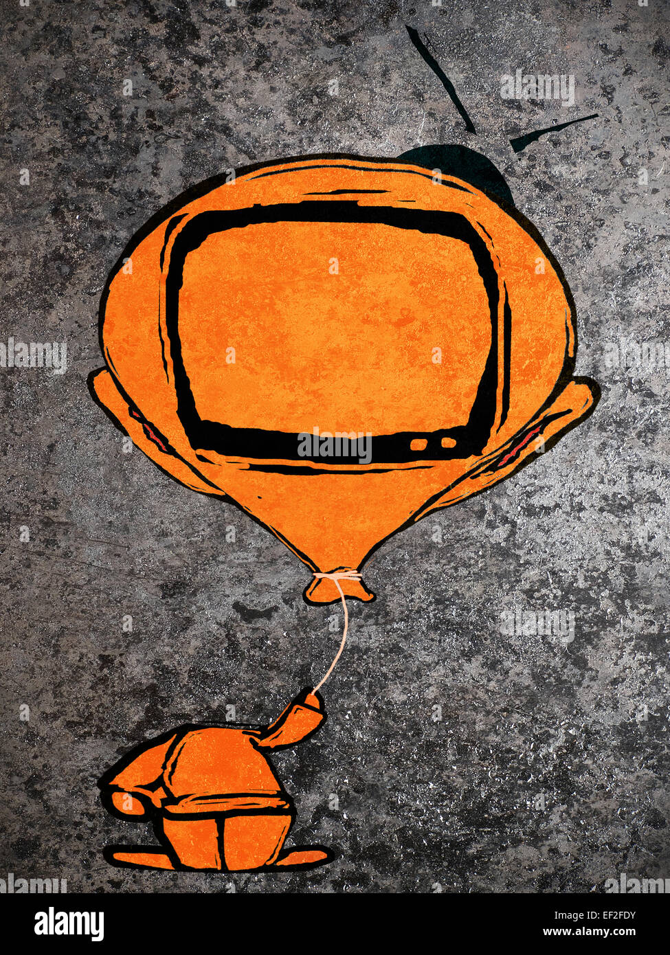 Orange Mann mit Ballon-Fernsehen-Kopf Stockfoto