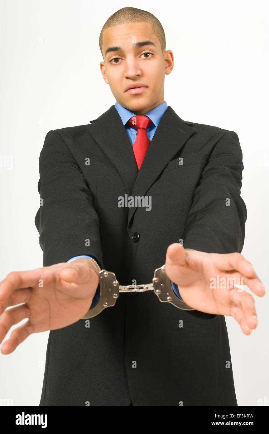 Handschellen Geschäftsmann Stockfoto