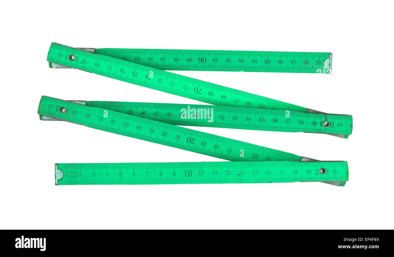 Carpenters Regel mit Zentimeter zahlen, isoliert in weiß, grün Stockfoto