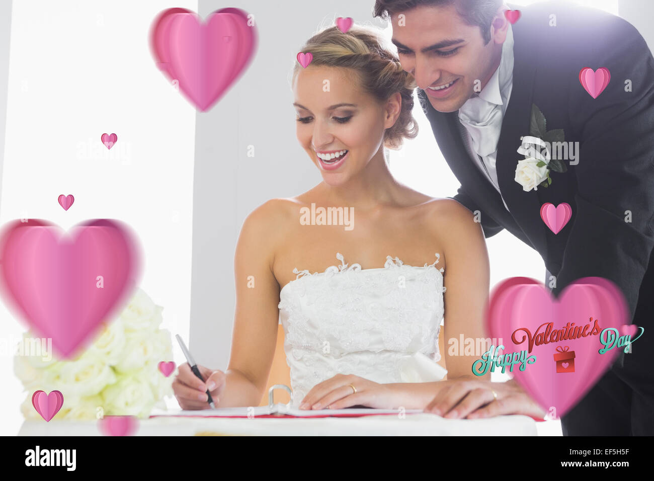 Zusammengesetztes Bild des jungen Brautpaares Unterzeichnung Hochzeit register Stockfoto