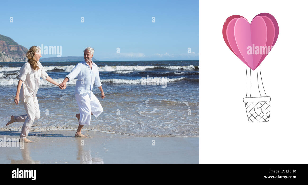 Zusammengesetztes Bild des glücklichen Paares überspringen barfuß am Strand Stockfoto