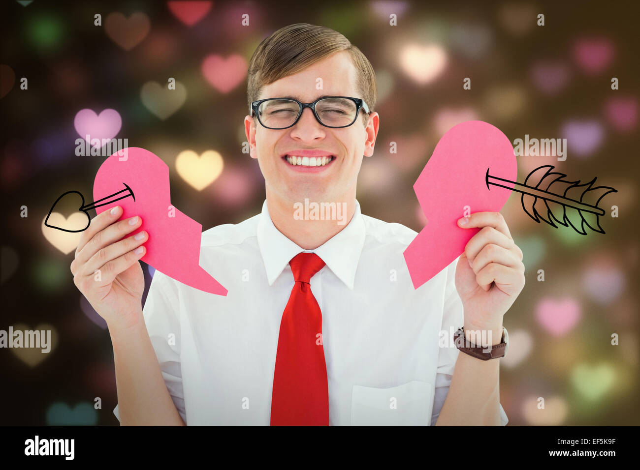 Zusammengesetztes Bild von broken hearted geek Stockfoto