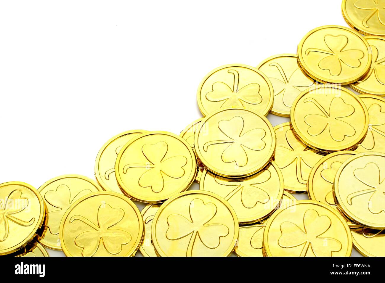 St. Patricks Day Goldmünze Ecke Grenze auf einem weißen Hintergrund Stockfoto