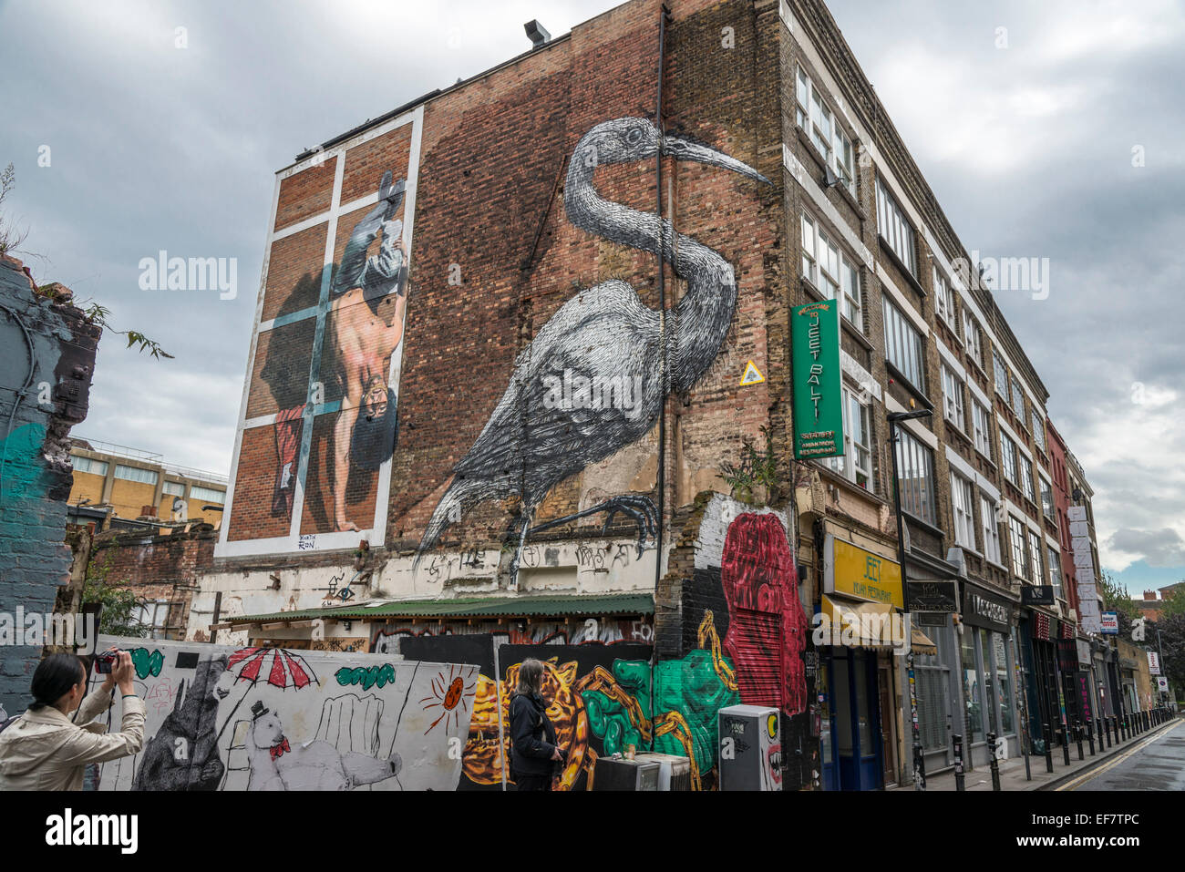 London städtische Straße Graffiti in der Brick Lane Teil der Stadt - nur zur redaktionellen Nutzung Stockfoto