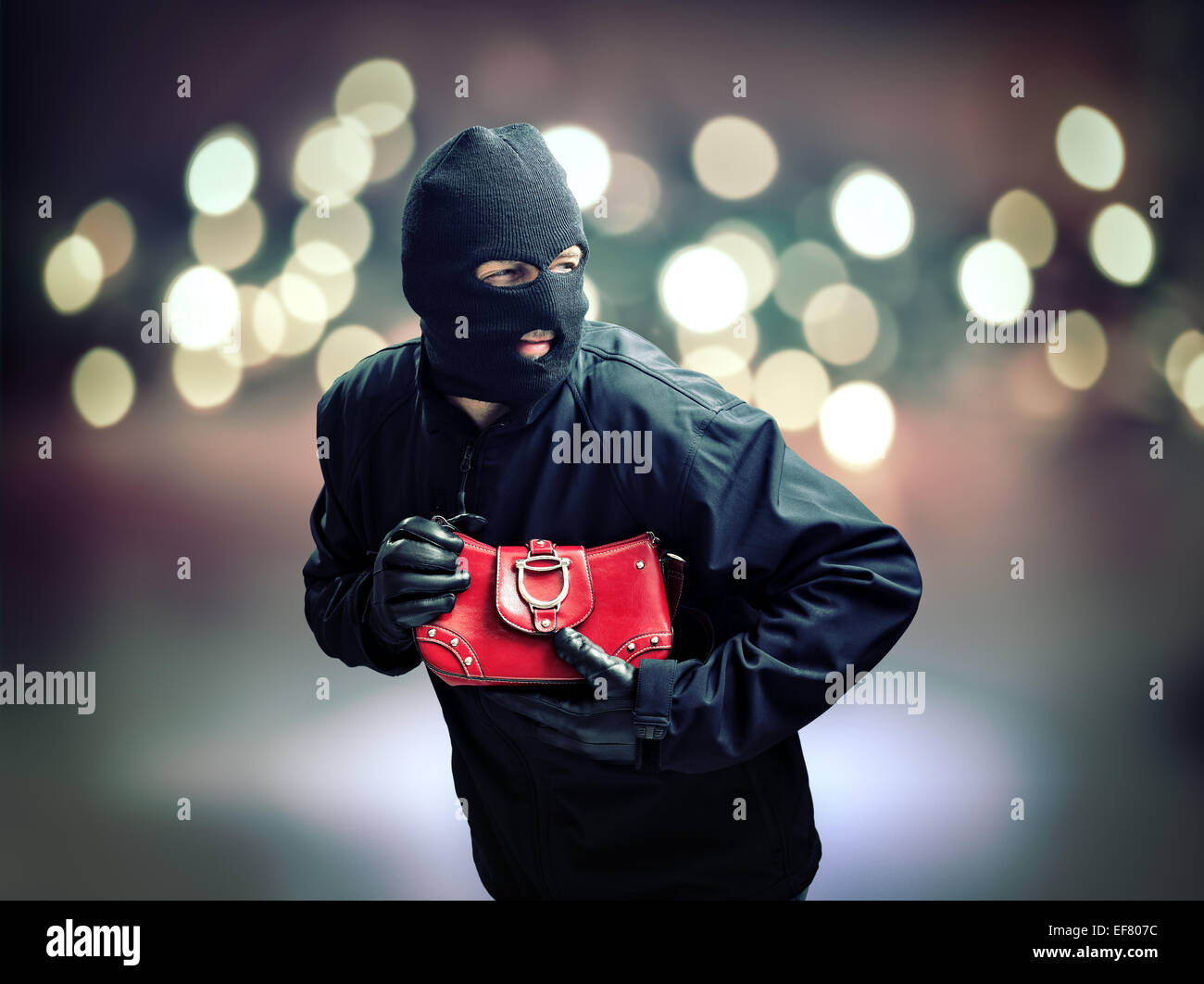 Dieb Diebstahl Womans Handtasche Stockfoto