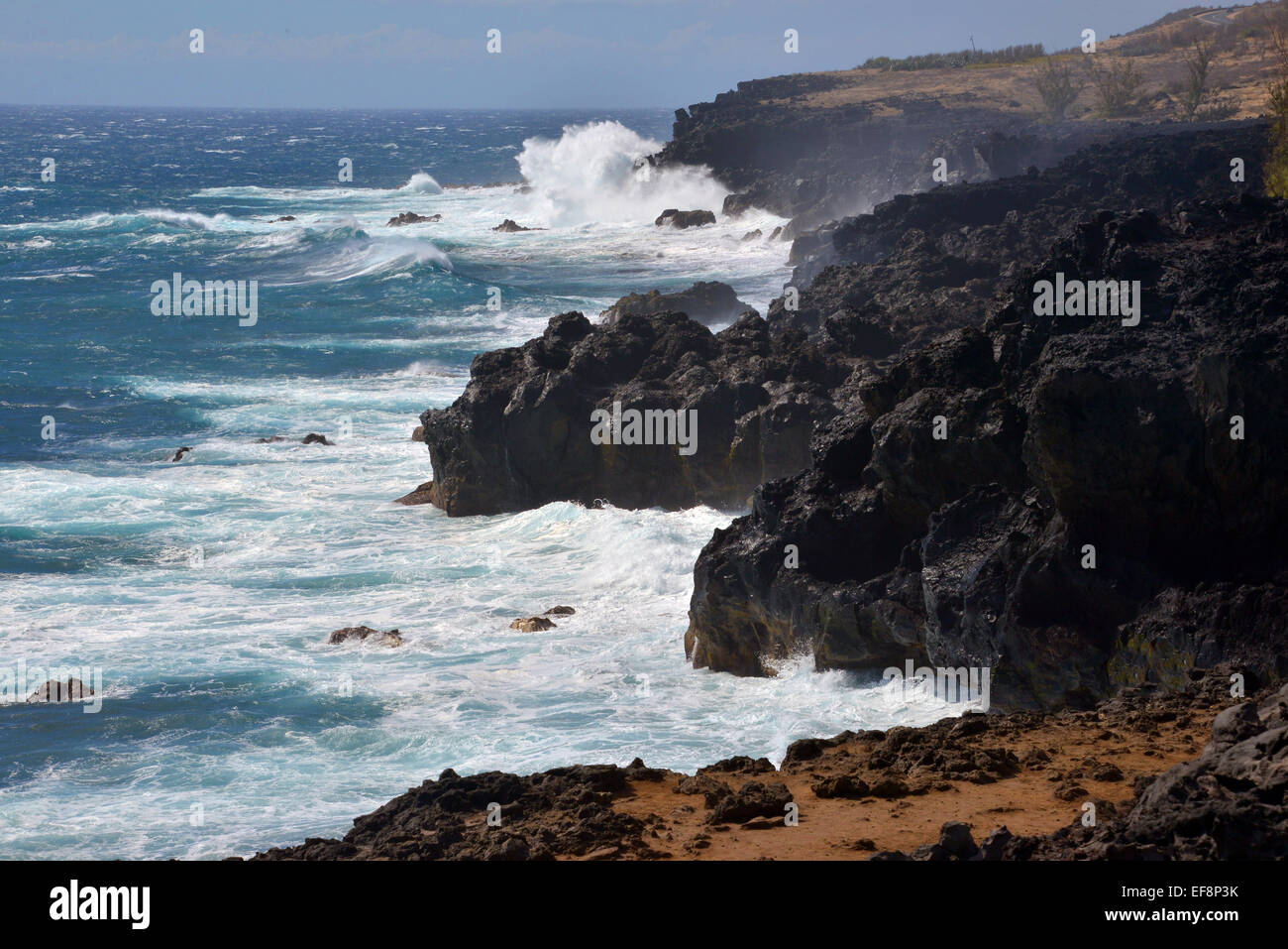 Spray, Vulkangestein, vulkanischen Küste, West-Küste mit Klippen, St Leu, Réunion Stockfoto