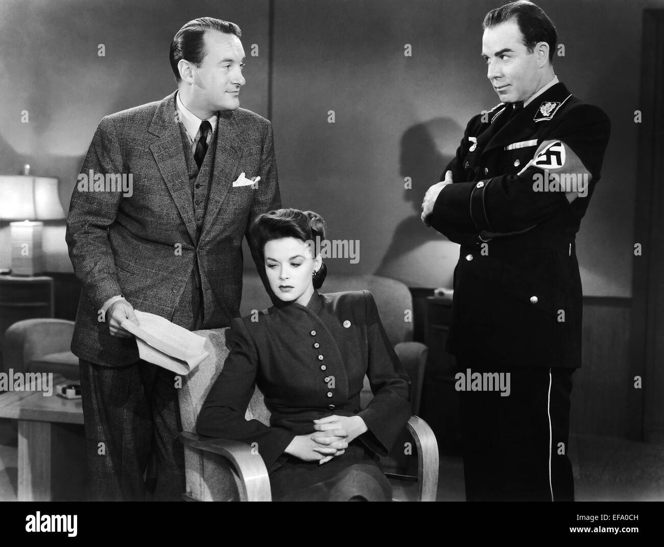 GEORGE SANDERS, MARGUERITE CHAPMAN, FREDERIC BRUNN, TERMIN IN BERLIN, 1943 Stockfoto