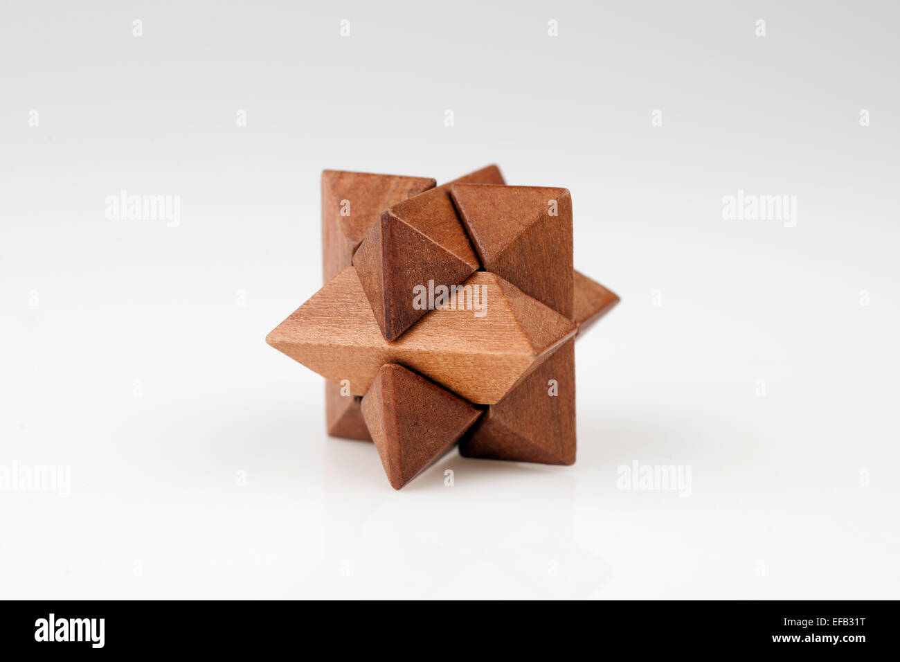 Holz Puzzle in Form eines Sterns Stockfoto