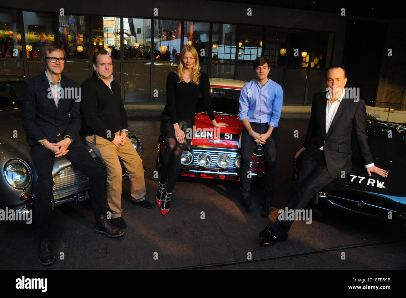 London, UK. 30. Januar 2015. Moderatoren Jodie Kidd & Quentin Wilson starten den Kanal 5 Classic Car Show mit Ith Autos aus der Serie, darunter ein Jaguar E-Type und Aston Martin DB5 im Soho Hotel. Bildnachweis: JOHNNY ARMSTEAD/Alamy Live-Nachrichten Stockfoto