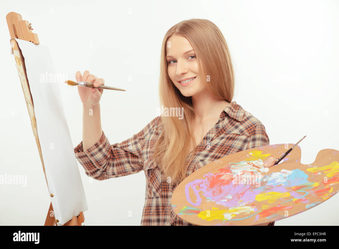 Junge schöne Künstler ein Meisterwerk zu schaffen Stockfoto