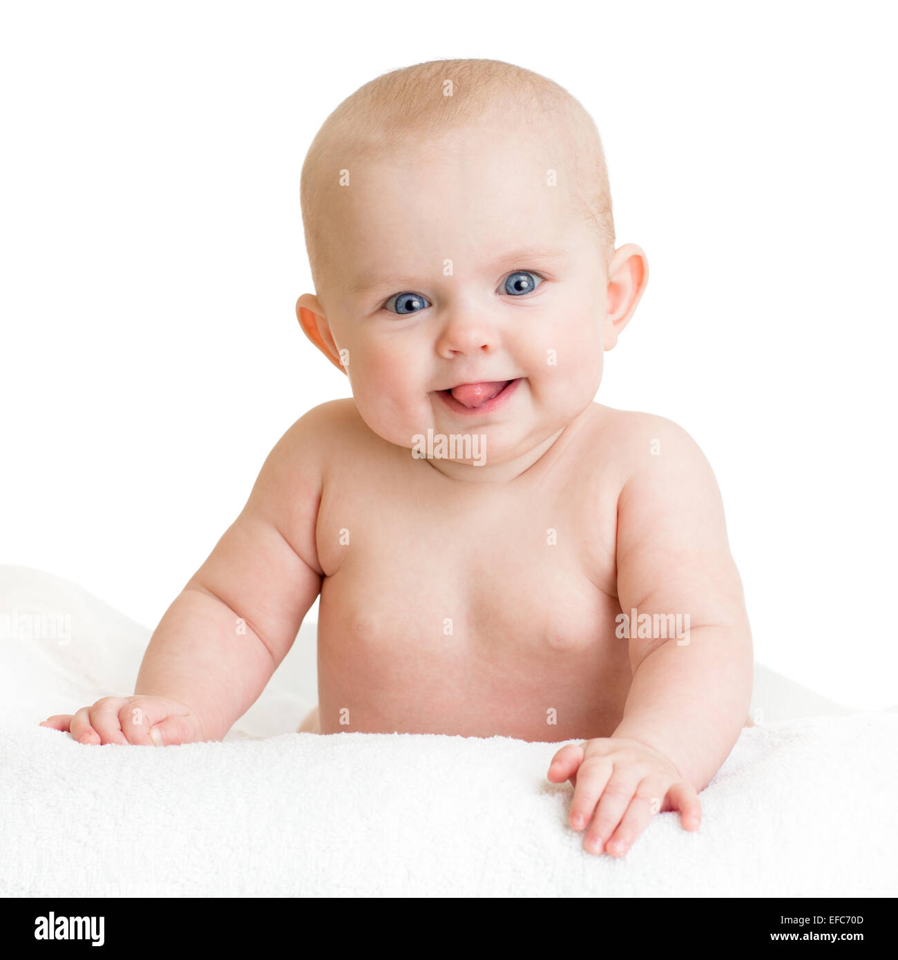 Niedliche glückliches Baby Kind liegen isoliert auf weiss Stockfoto