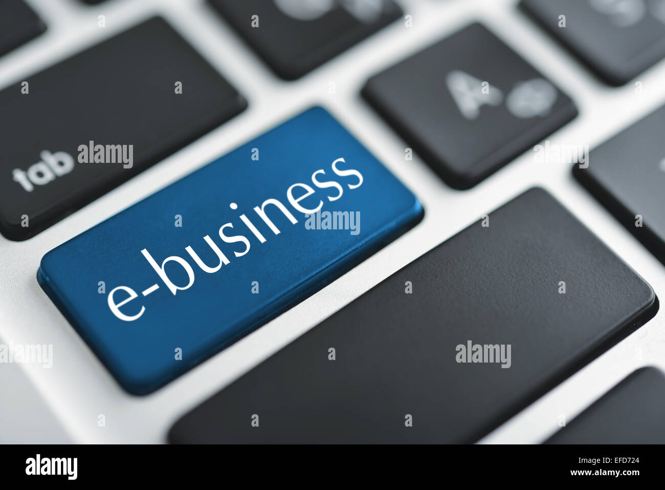 e-Business-Taste auf eine weiße Tastatur Nahaufnahme. E-Commerce Konzept Bild Stockfoto