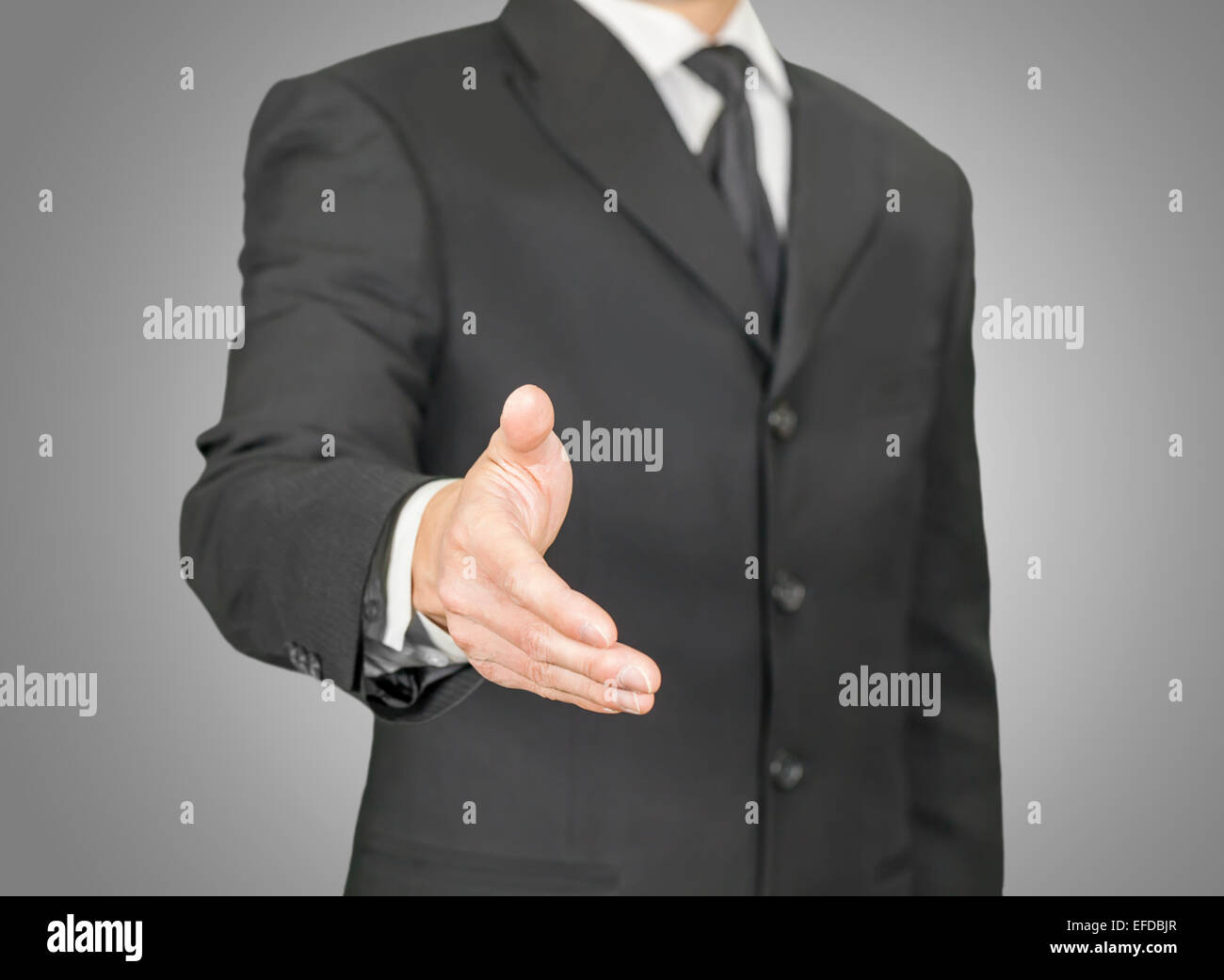 Geschäftsmann mit einem Handschlag Stockfoto