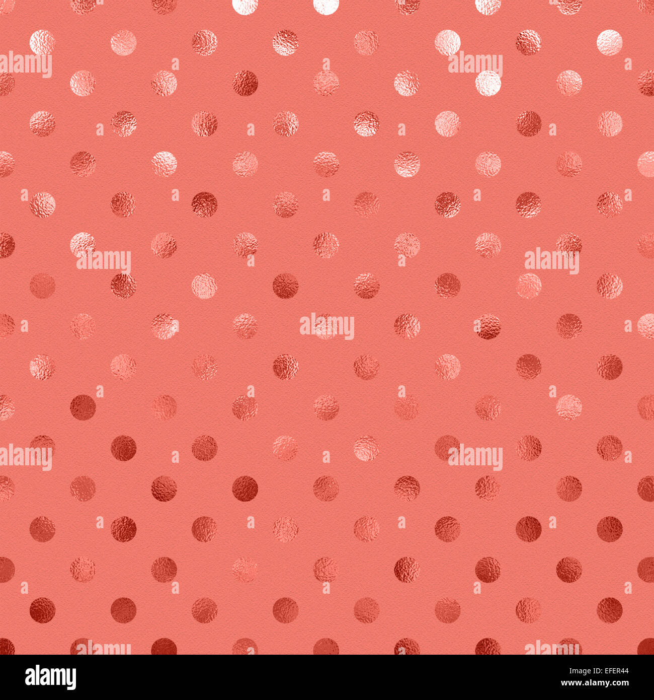 Pfirsich Aprikose rosa Metallfolie Polka Dot Muster Swiss Dots Textur Papier Farbe Hintergrund Stockfoto