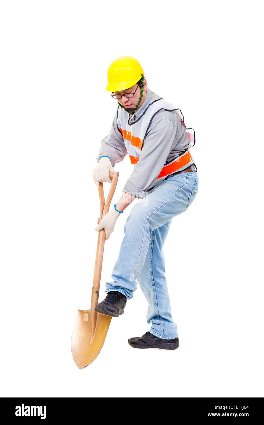 Arbeiter graben mit Schaufel isoliert auf weiss Stockfoto