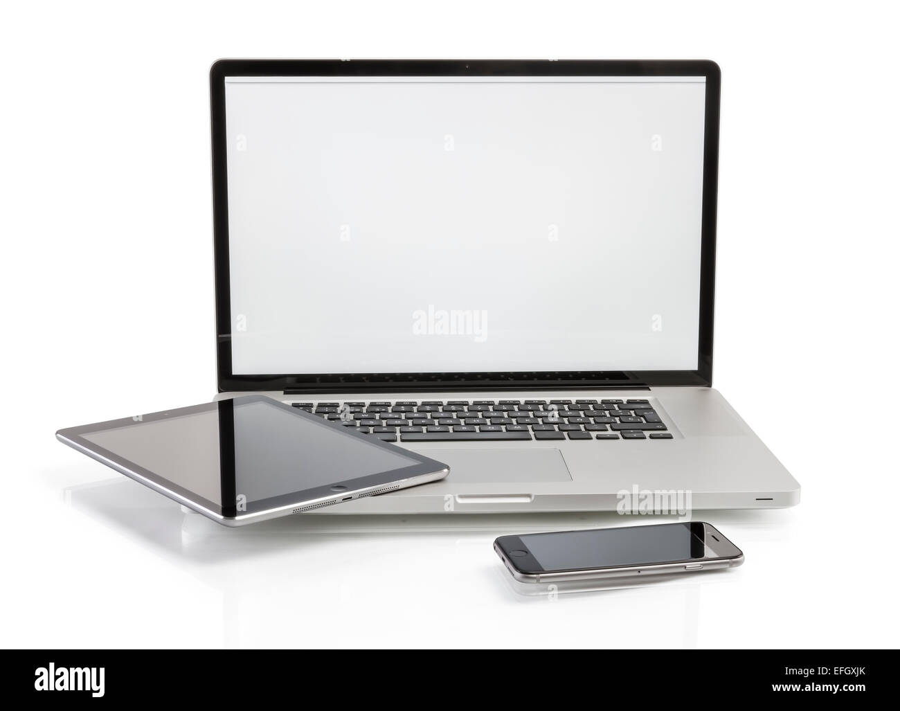 Moderne EDV-Geräte - Laptop, TabletPC und Smartphone mit textfreiraum auf Bildschirm Stockfoto
