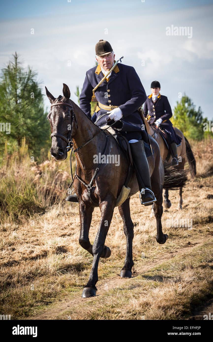 Der Feld-Master und eine Dame Fahrer, die Teilnahme an einer Jagd mit Hunden in der Landes-Region (Frankreich). Stockfoto