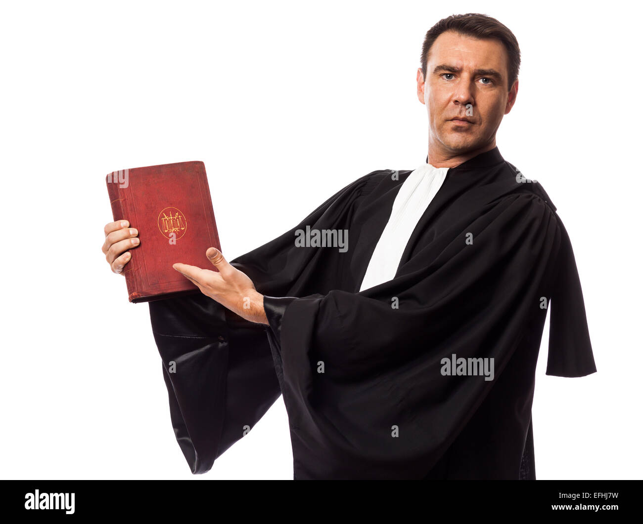 eine kaukasische Rechtsanwalt Mann zeigt Gesetzbuch im Studio isoliert auf weißem Hintergrund Stockfoto