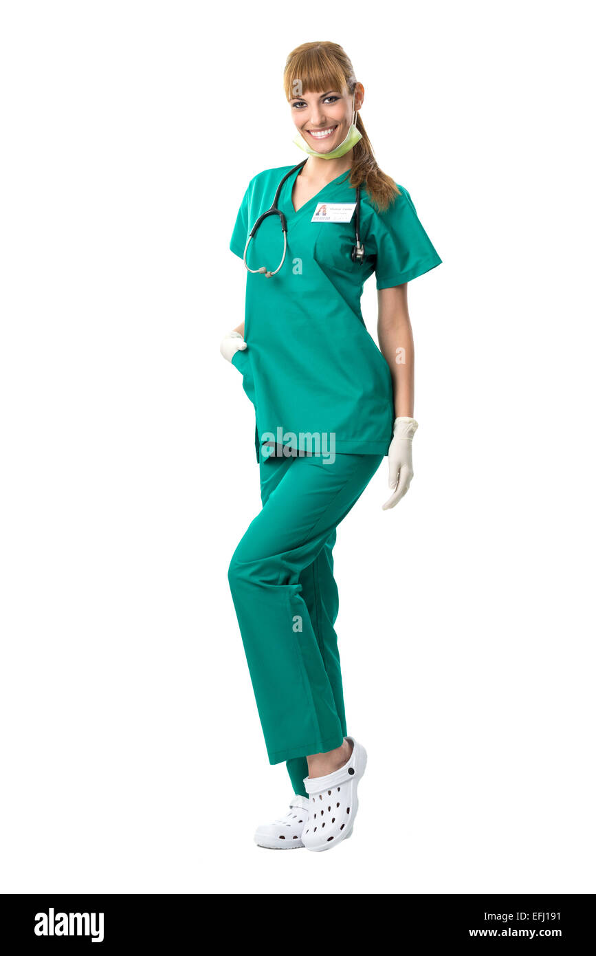 Hübsche Chirurg Frau im grünen Kleid Stockfoto