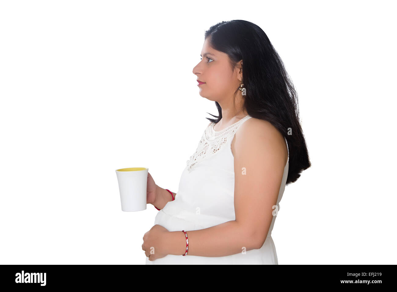 1 indische Schwangerschaft Frau trinken Kaffee Stockfoto