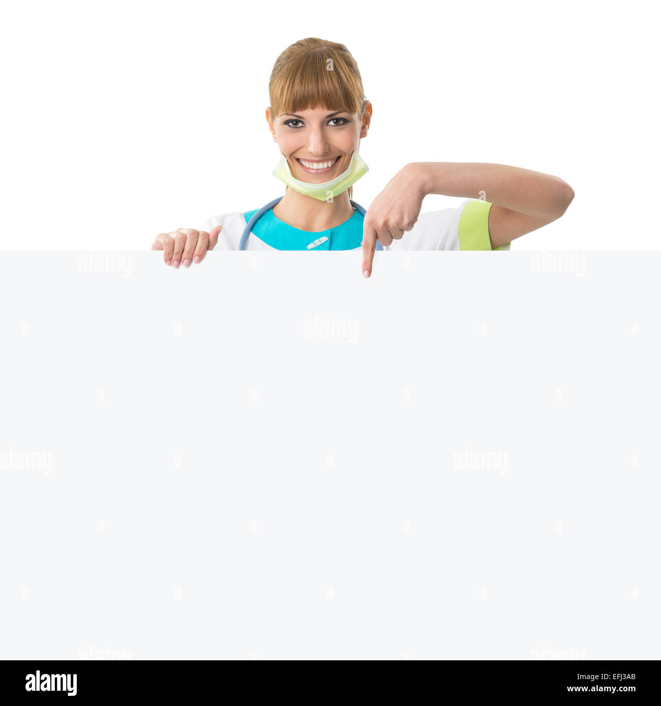 Schöne junge Frau Doktor zeigt leere Kammer Stockfoto