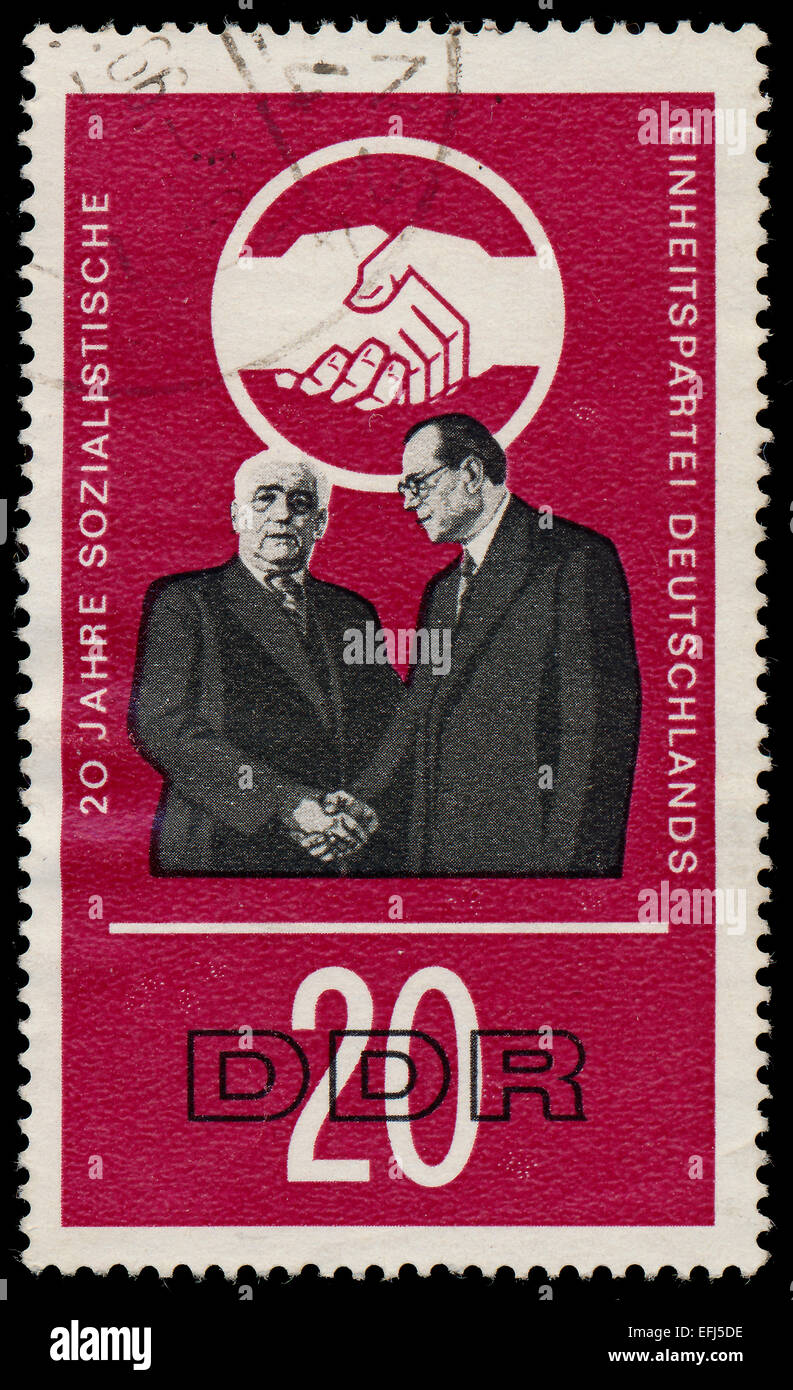 Deutsche Demokratische Republik - ca. 1966: Eine Briefmarke gedruckt in Deutschland zeigt die 20 Jahre Sozialistische Einheitspartei Deutschlands, ca. 1 Stockfoto