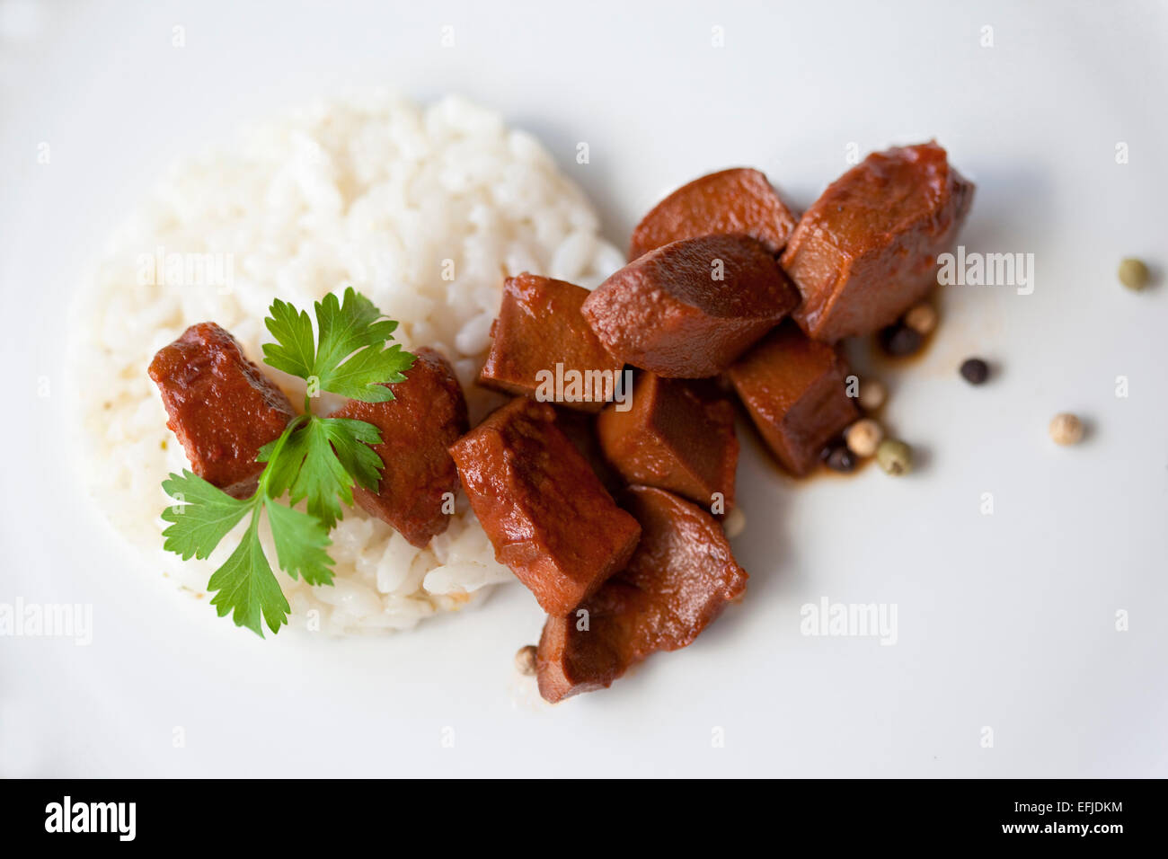 Seeteufel Leber, Reis und Petersilie auf einem Teller Stockfoto