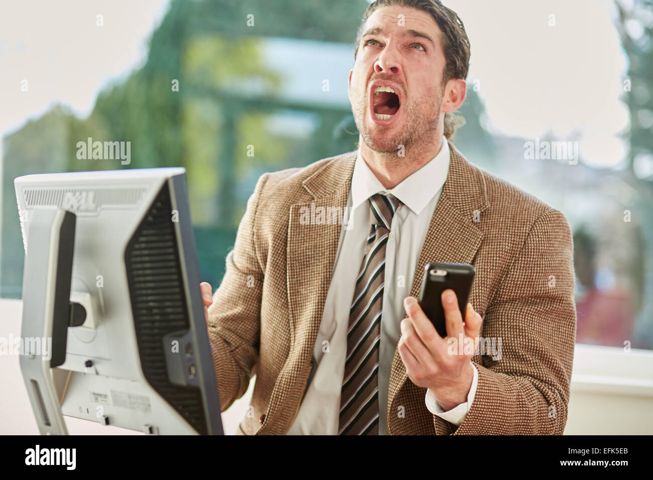 Mann bei der Arbeit gestresst Stockfoto