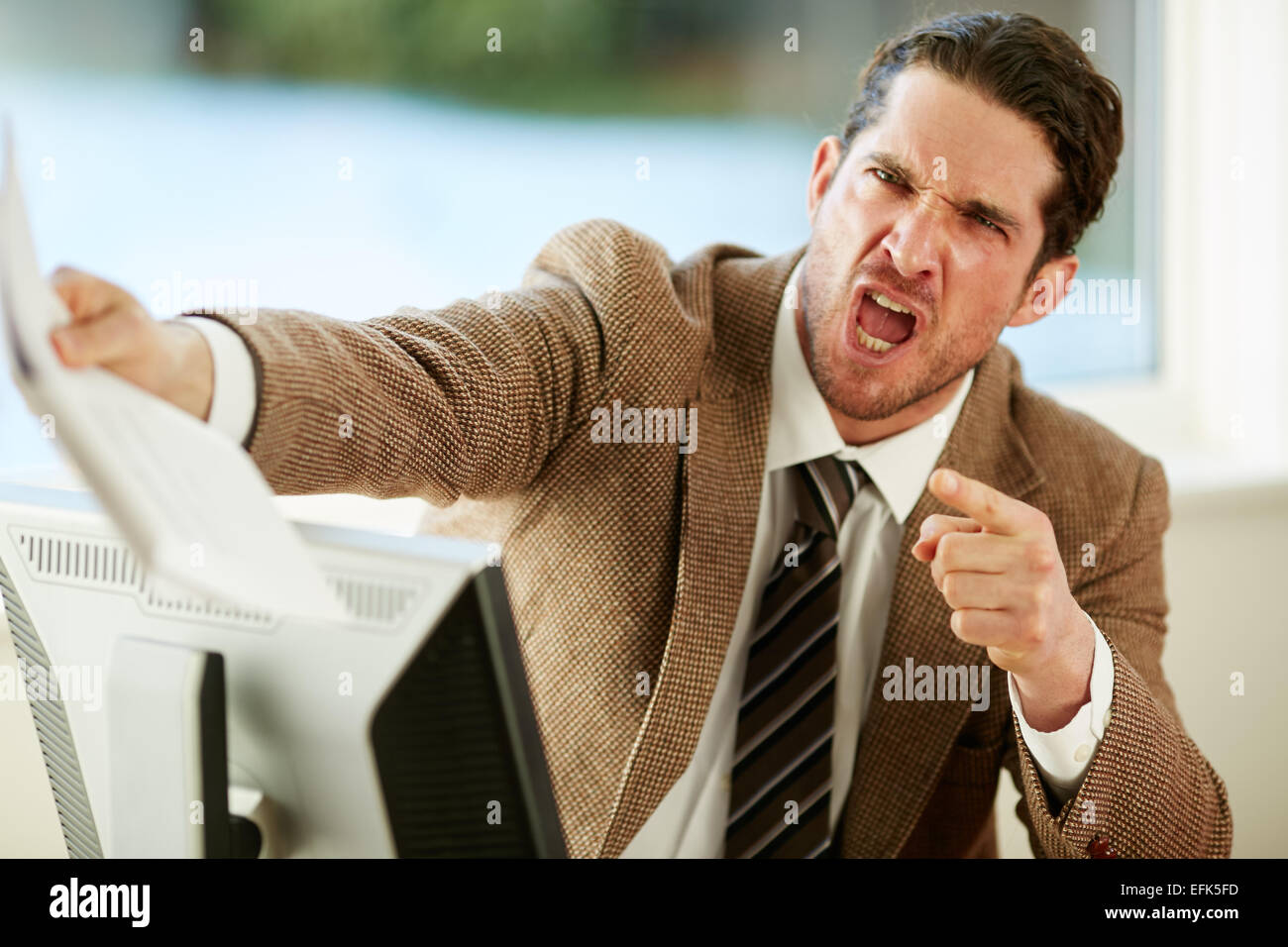 Aggressive Geschäftsmann Stockfoto