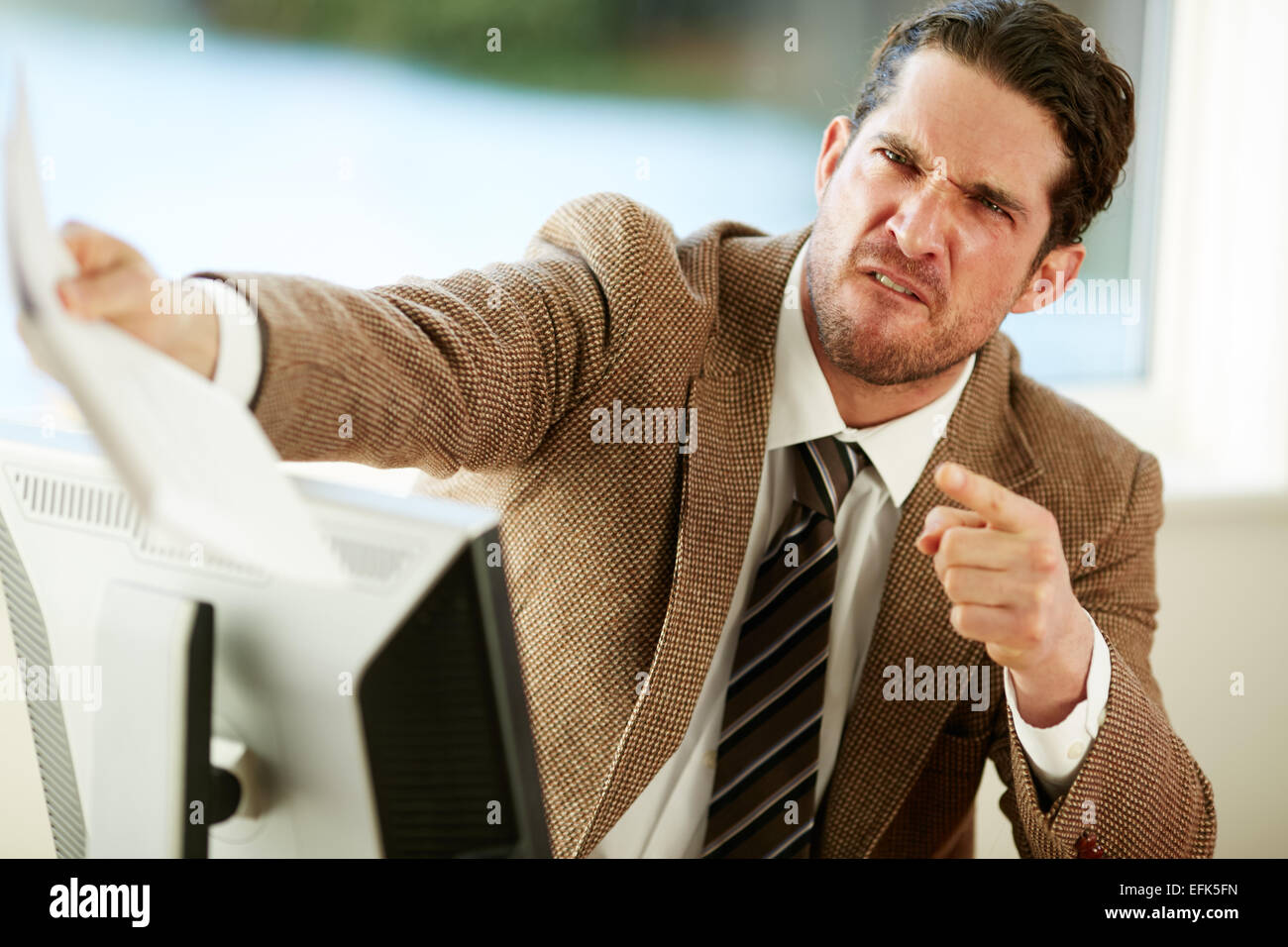 Aggressive Geschäftsmann Stockfoto