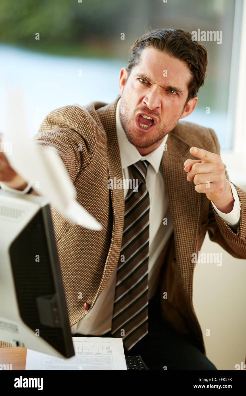 Aggressive Geschäftsmann Stockfoto