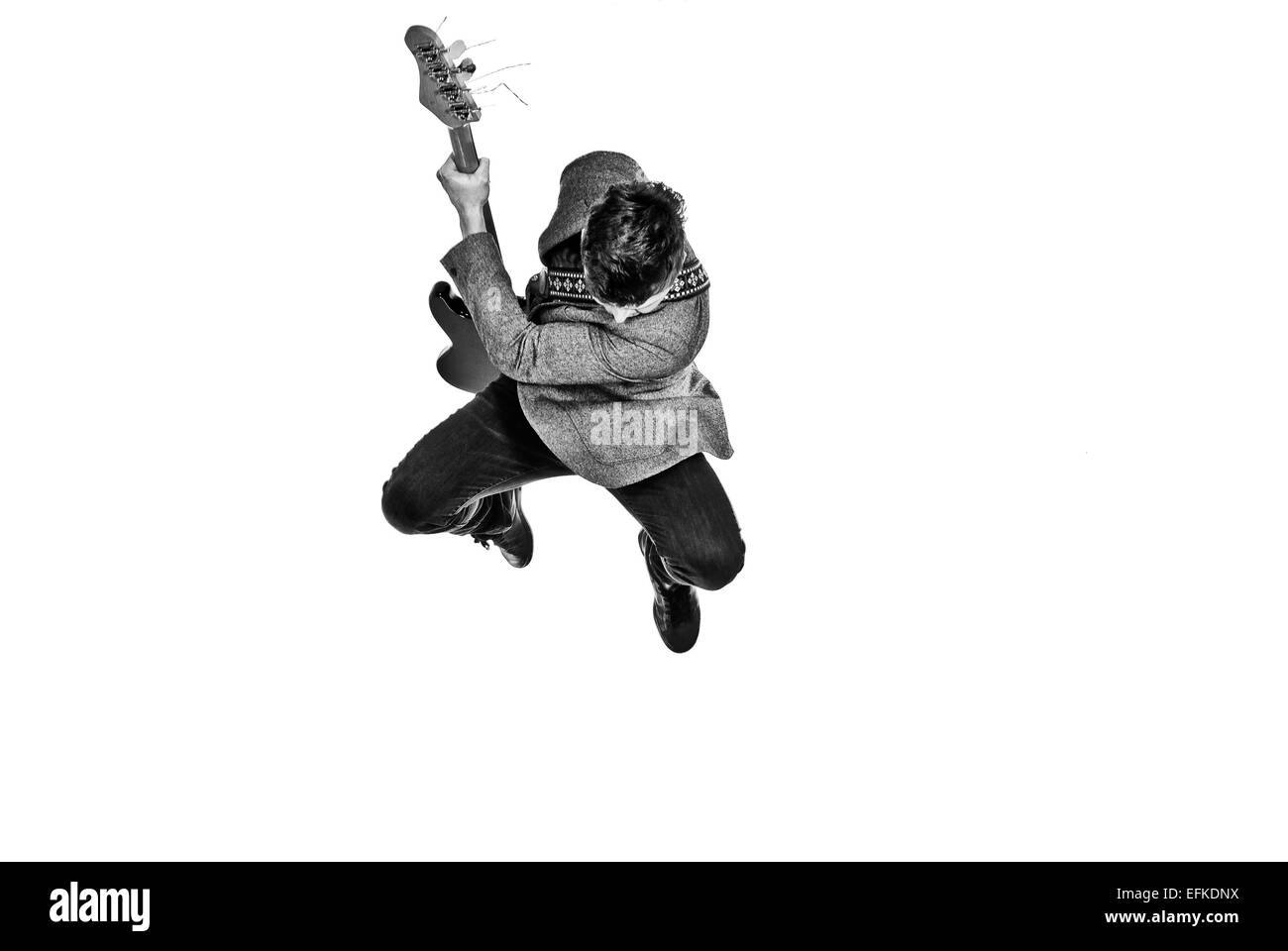 Gitarrist in die Luft springen Stockfoto