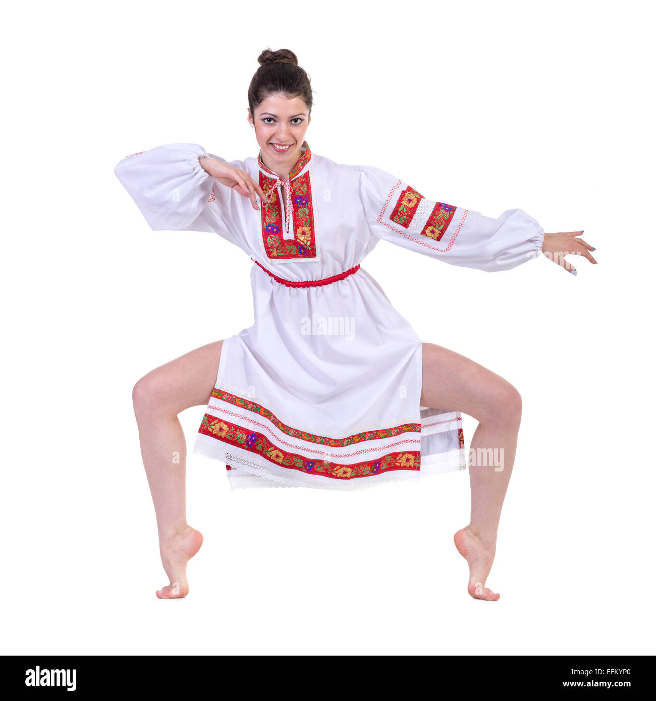 schöne Tänzerin in der ukrainischen polnischen nationalen Tracht Kleidung zufrieden Lächeln, isoliert in voller Länge portrait Stockfoto