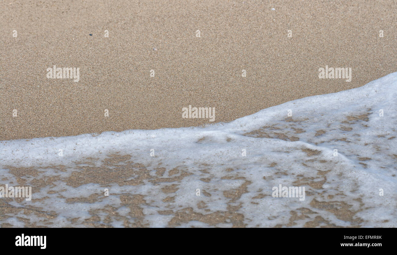 Meer Sandstrand Wasser Kante closeup Stockfoto