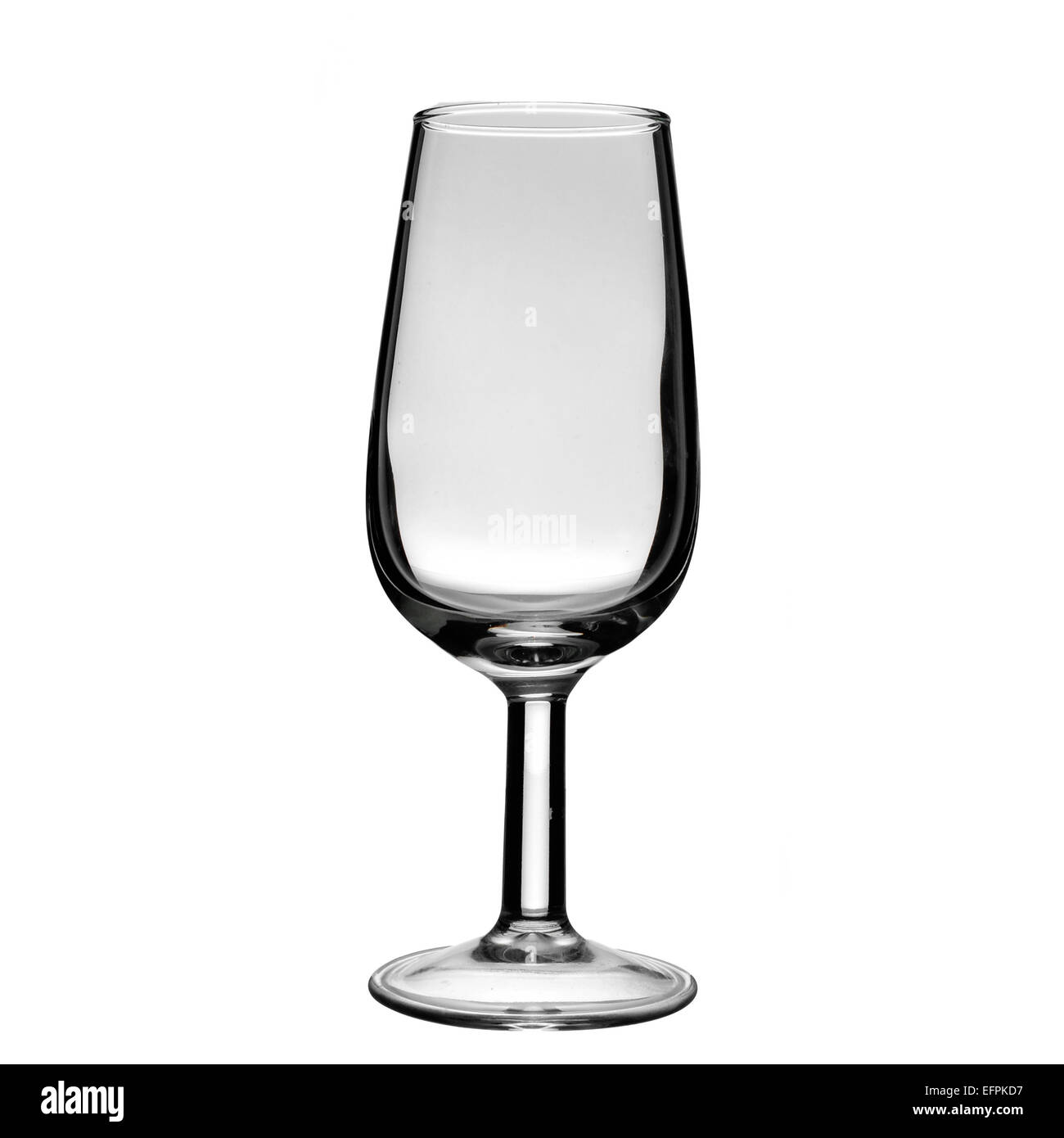 eine leere Sherryglas auf weißem Hintergrund Stockfoto