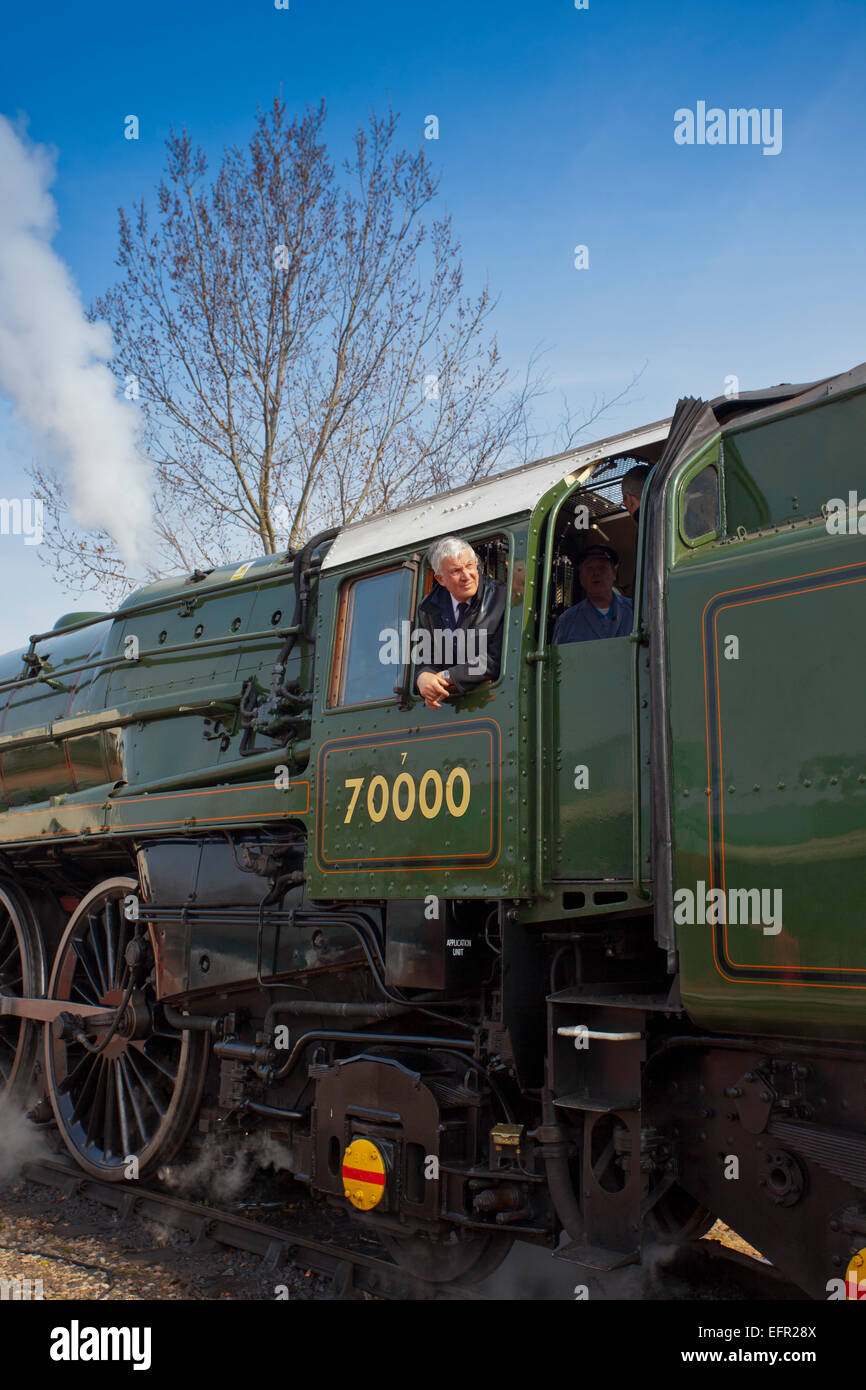 Merv Hebditch der Fahrer des Ex-BR express Lok Nr. 70000 "Britannia" während ihres Besuchs in der West Somerset Railway, England, UK Stockfoto