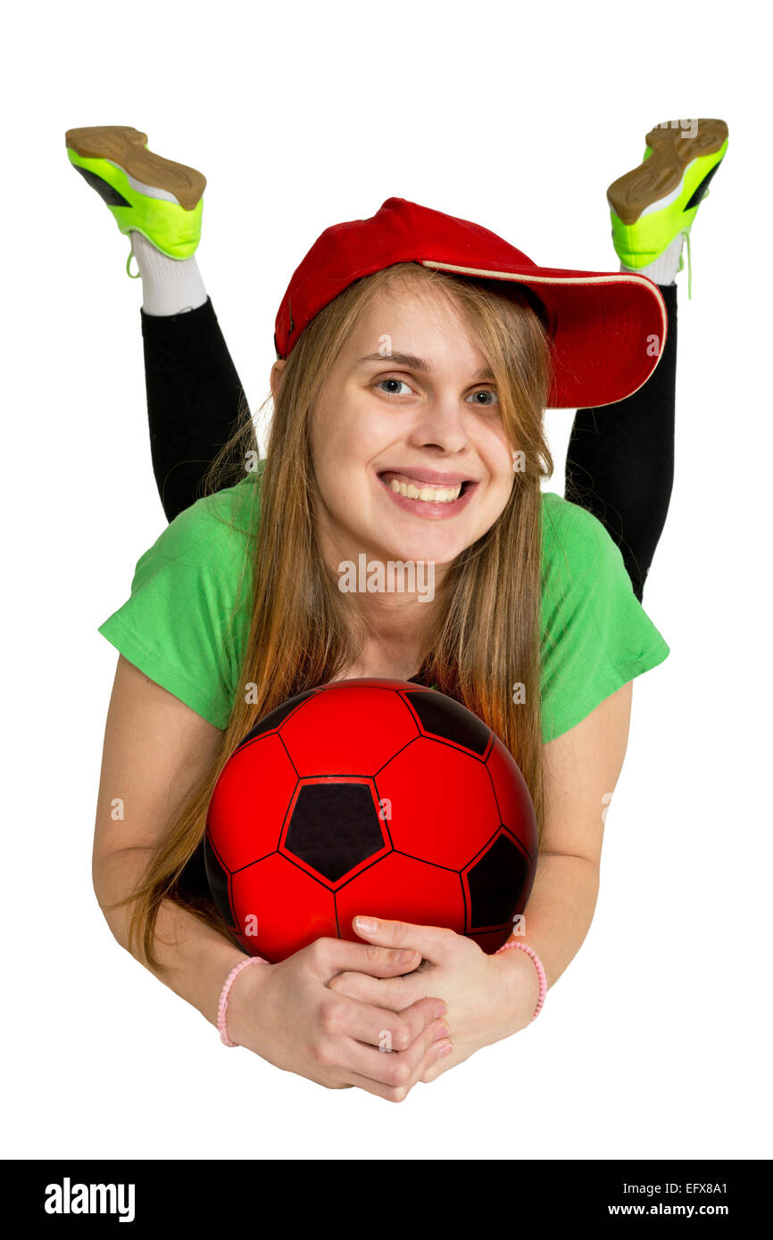 Mädchen mit Ball Lüge anfällig isoliert auf dem weißen Stockfoto