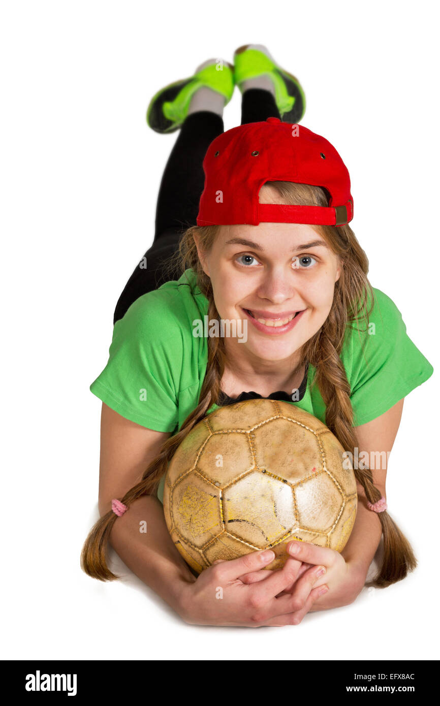 Mädchen mit Ball Lüge anfällig isoliert auf dem weißen Stockfoto