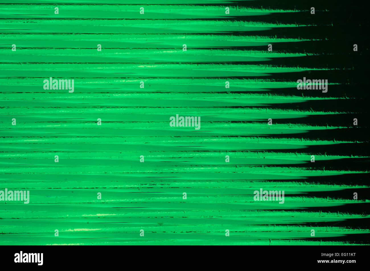 Makroaufnahme einer abstrakten Zeitmessung grünes Glas Stockfoto