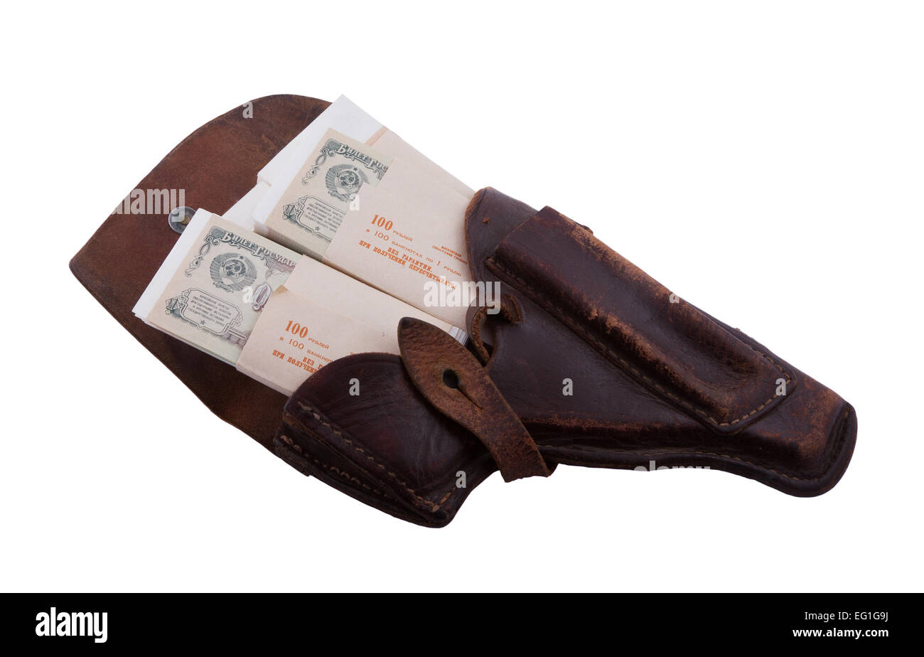 Stapel von Geld aus der Waffe im Holster - Geld zu Waffe Stockfoto