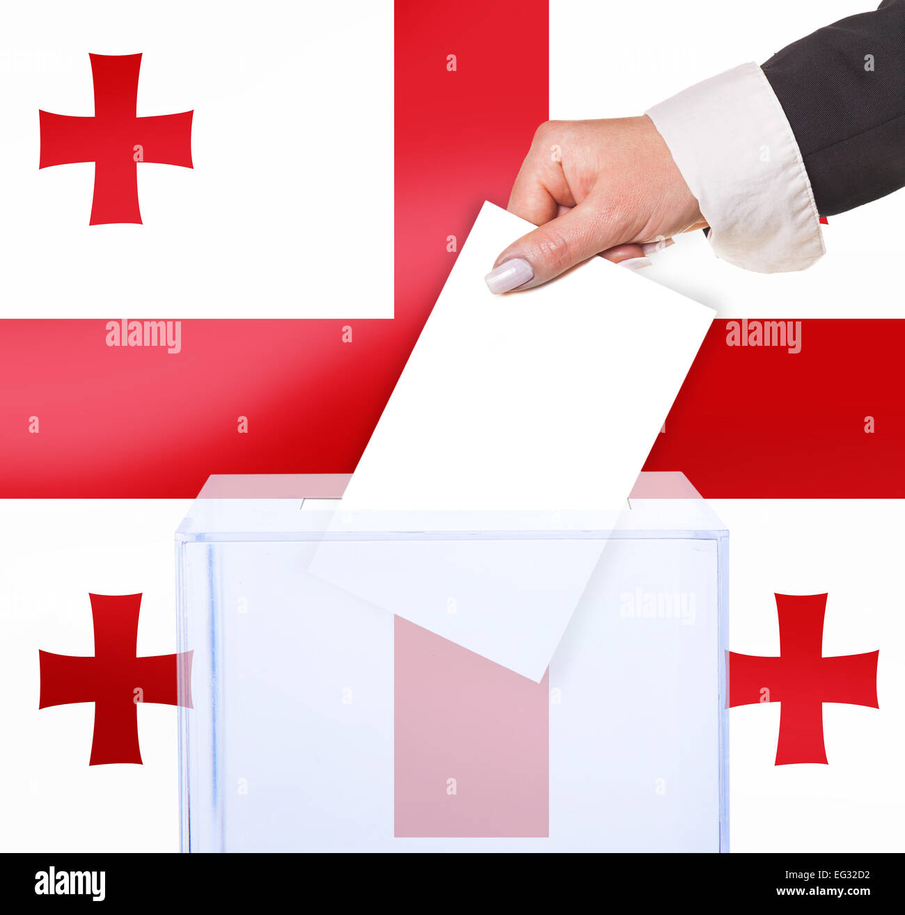 Wahlhilfe Abstimmung durch Stimmzettel, unter der Flagge von Georgien Stockfoto