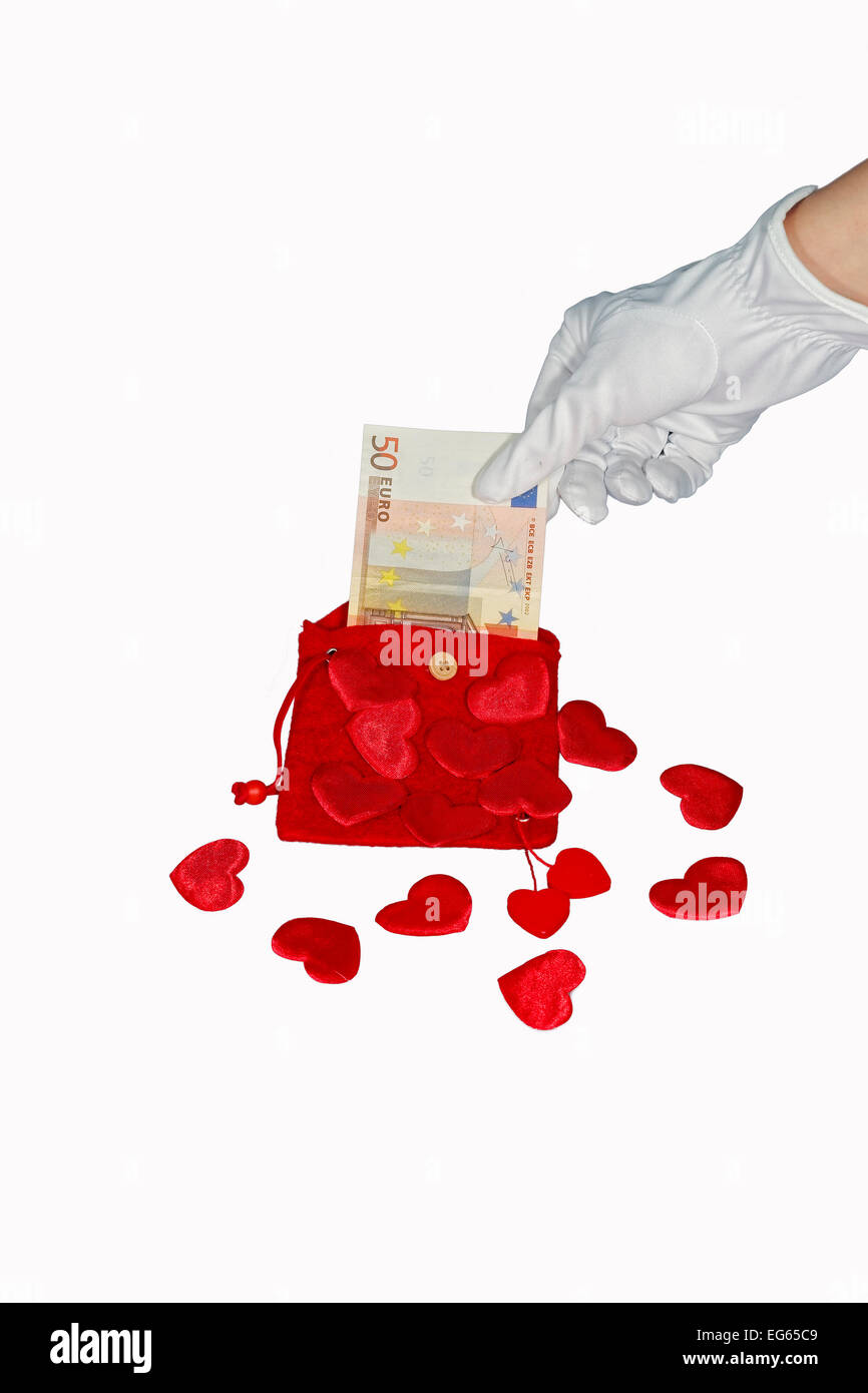 Rote Handtasche mit roten Herzen und fünfzig Euro banknote Stockfoto