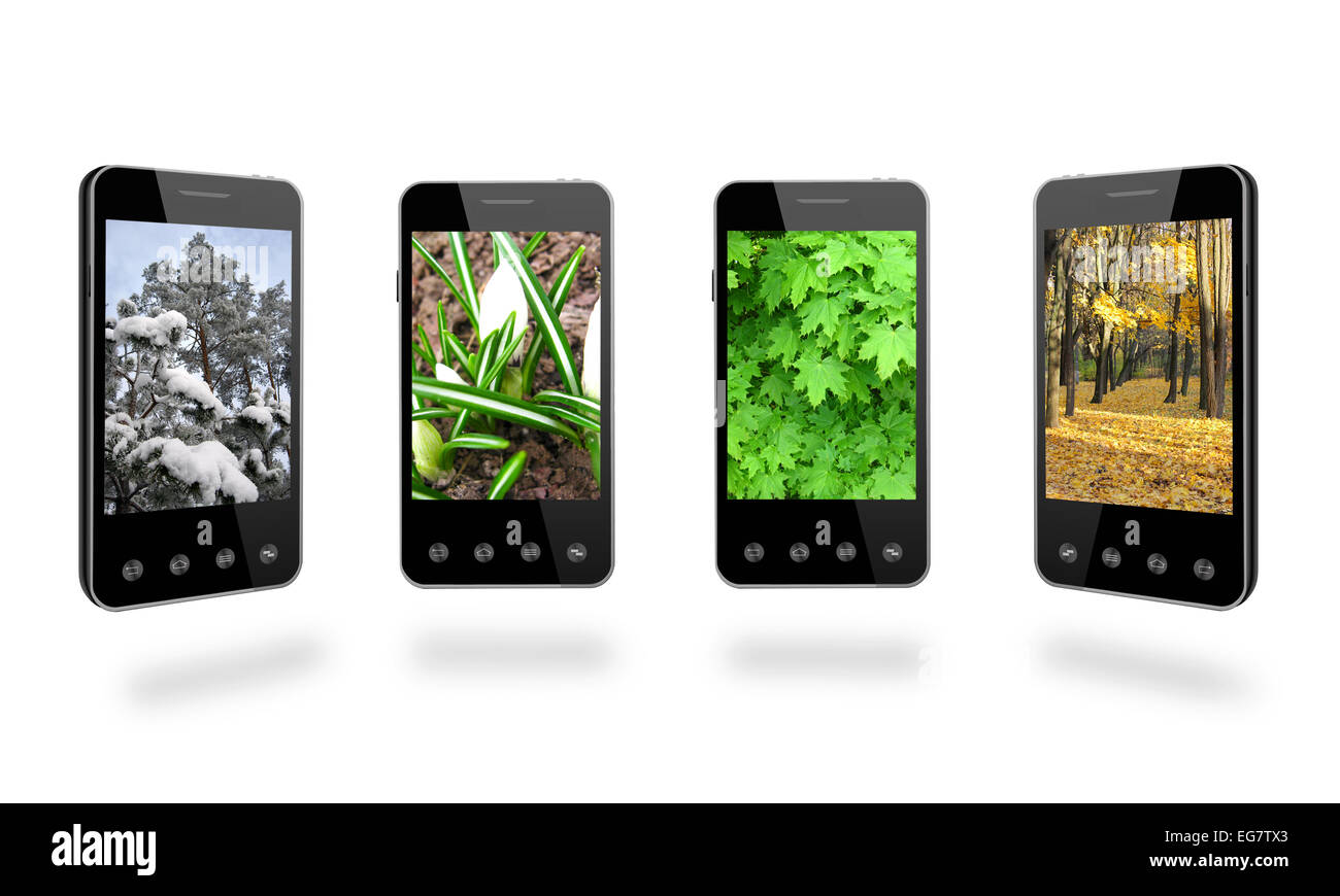 vier Smart-Phones mit farbigen Bildern von Jahreszeiten auf dem weißen Hintergrund isoliert Stockfoto
