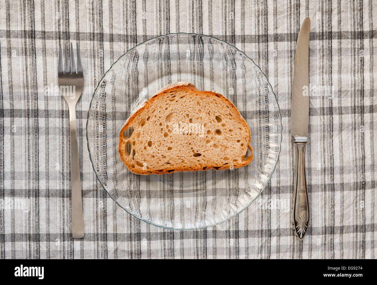 Brot schneiden schlechte Mahlzeit Stockfoto