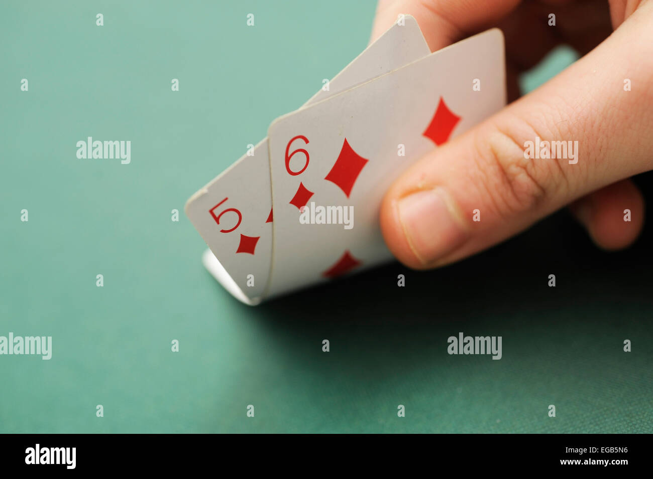Fünf und sechs Karten spielen Stockfoto