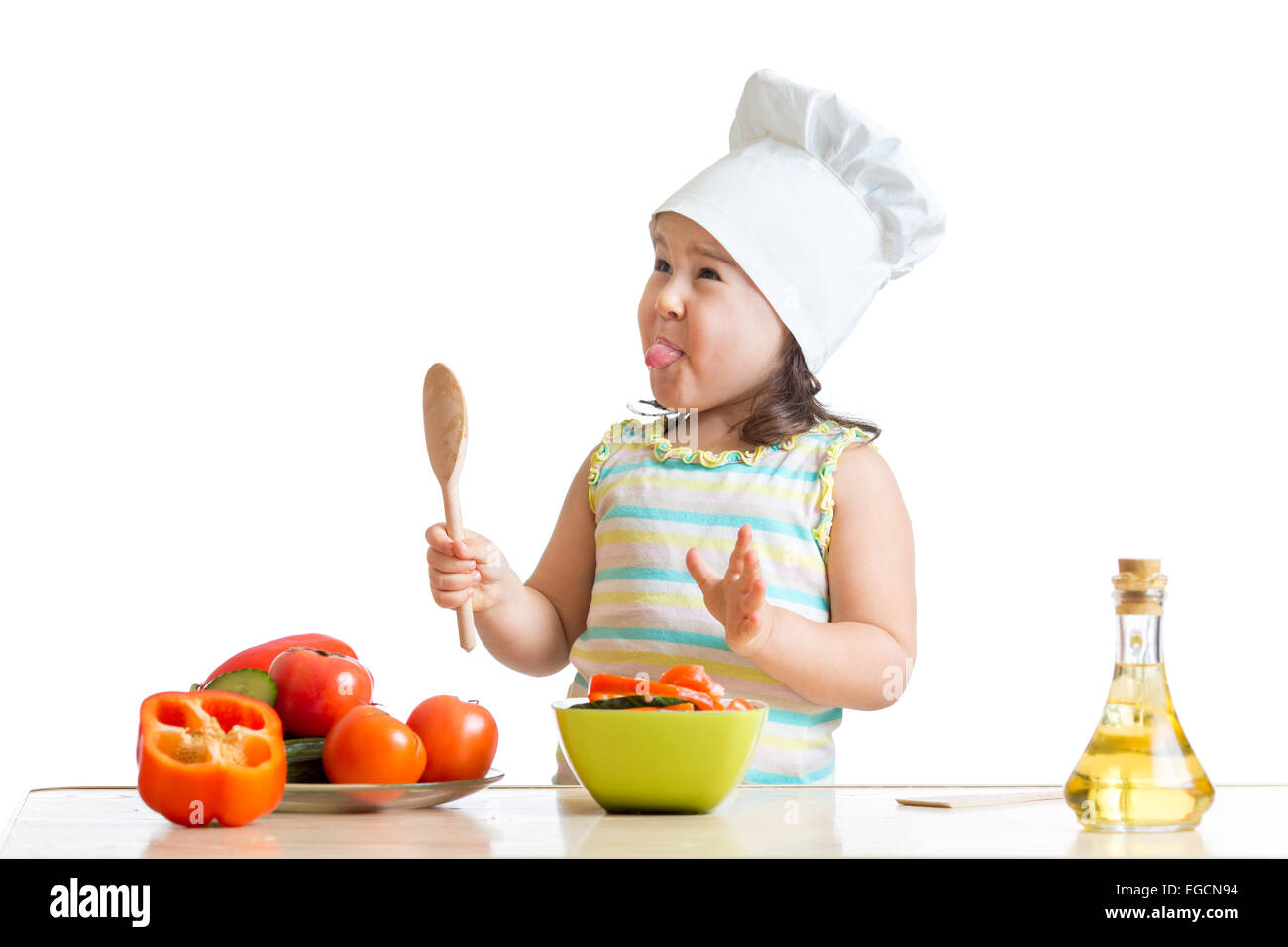 Kind Mädchen Zubereitung von gesunden Speisen Stockfoto