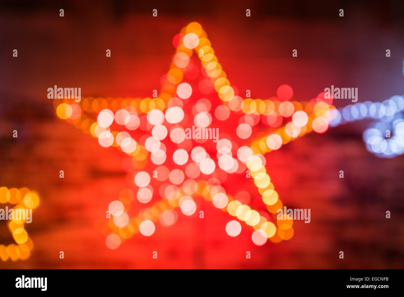 Weihnachten glänzende Sterne leuchten Weichzeichner Hintergrund Stockfoto