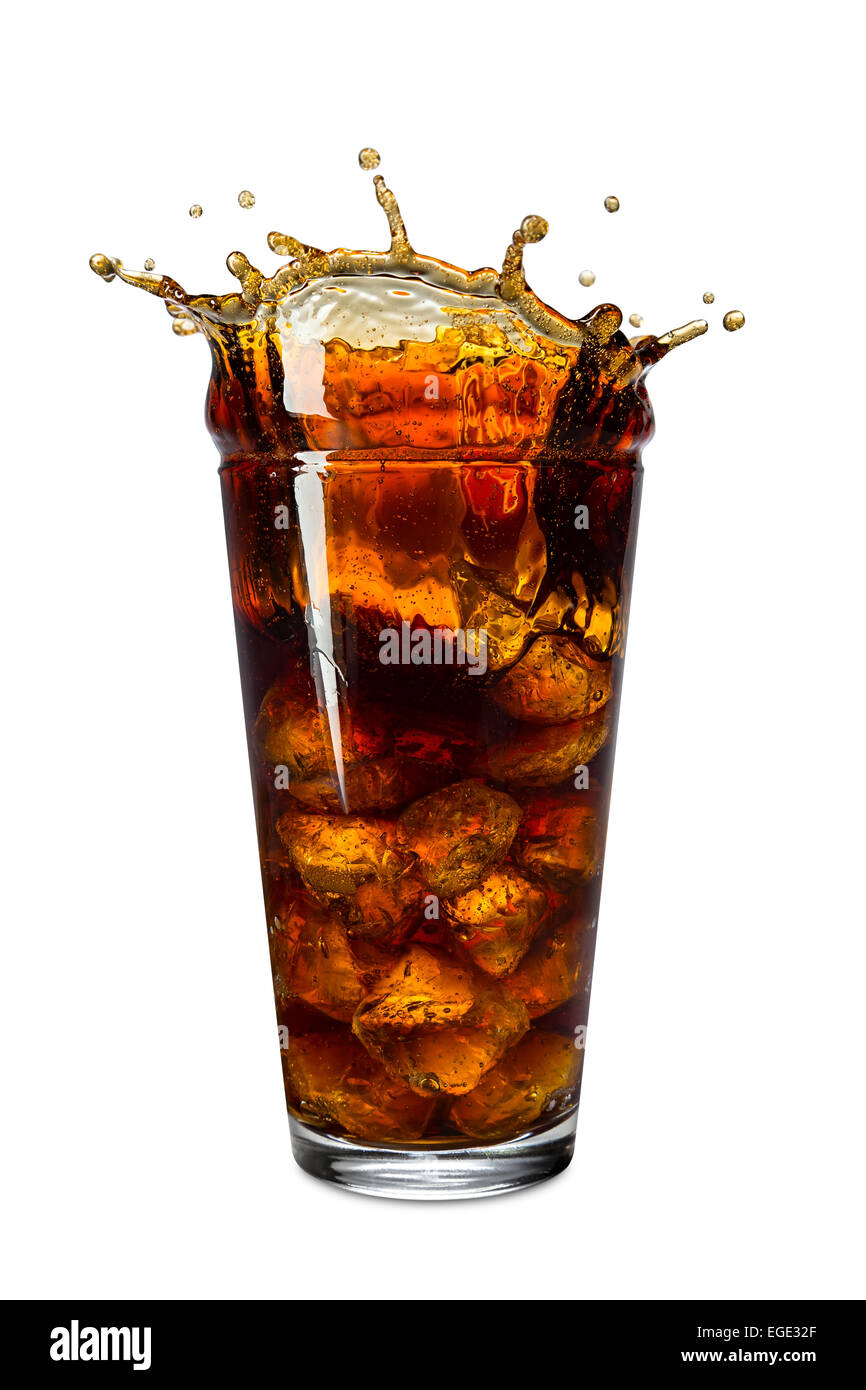 Eis-Spritzer ins Glas cola Stockfoto